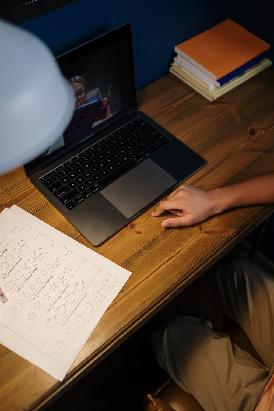 Student following an online class on a laptop